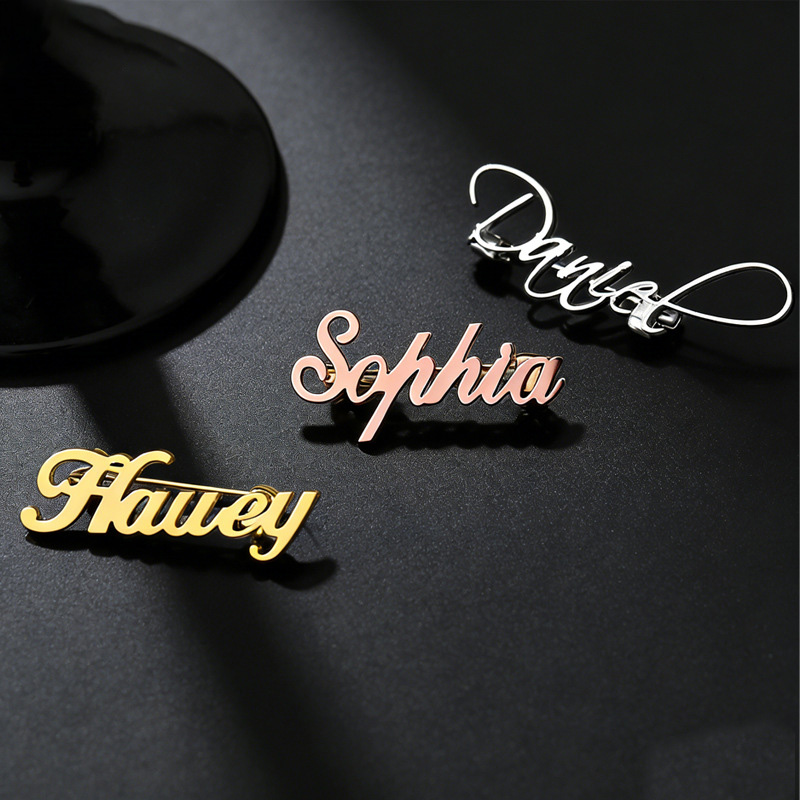 เข็มกลัดติดเสื้อสแตนเลสสตีล สล - Embroidery Name บทวิจารณ์และราคา